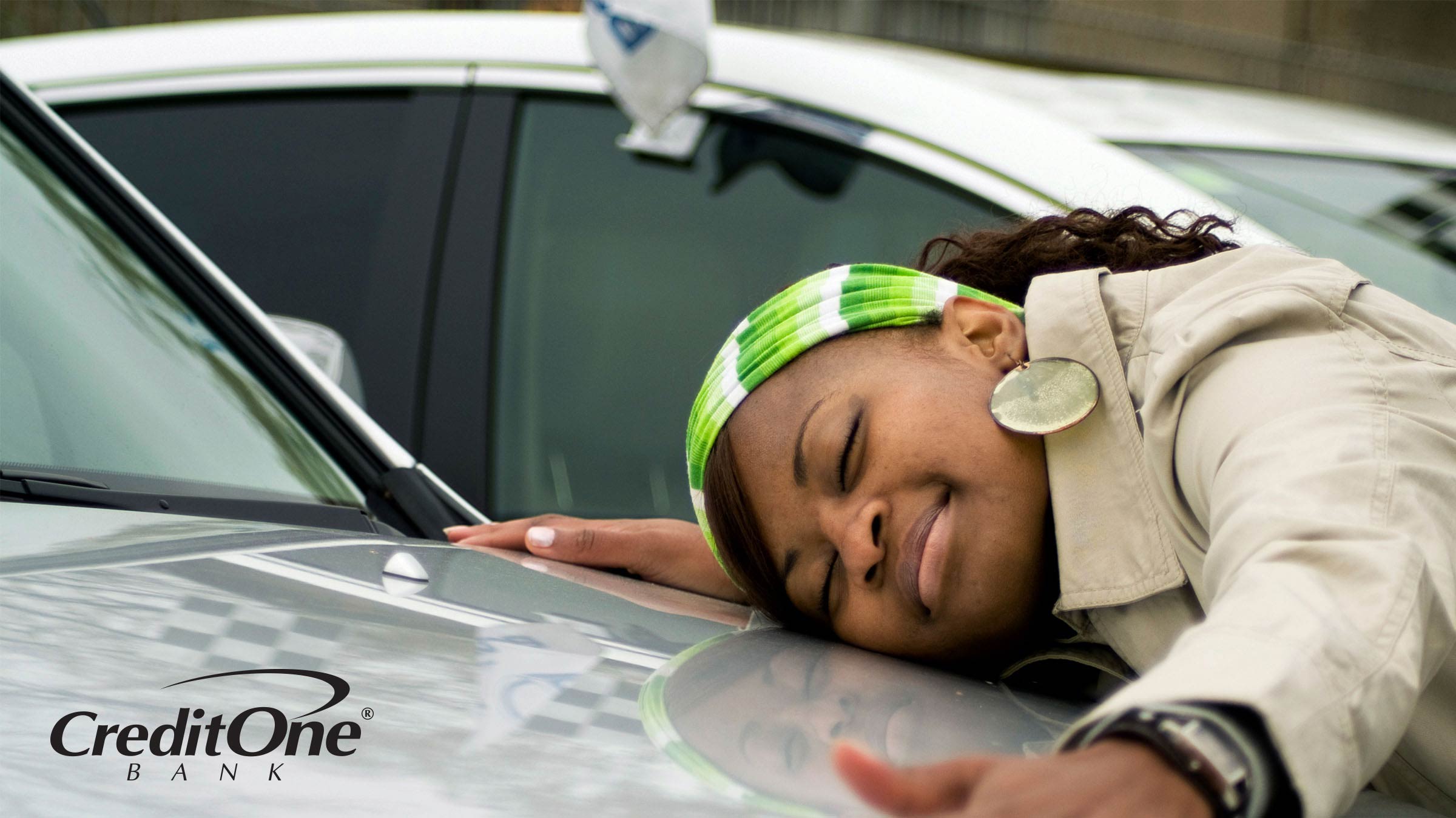 Woman excited about the purchase of her brand new car